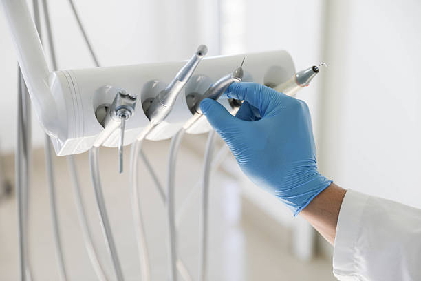 Professional Tooth Extraction technician working in Elizabethtown, NC